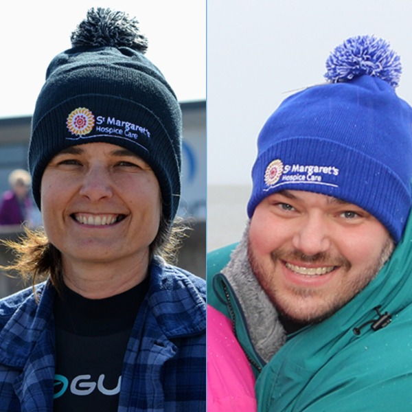 one female wearing a black bobble hat and one female wearing a blue bobble hat