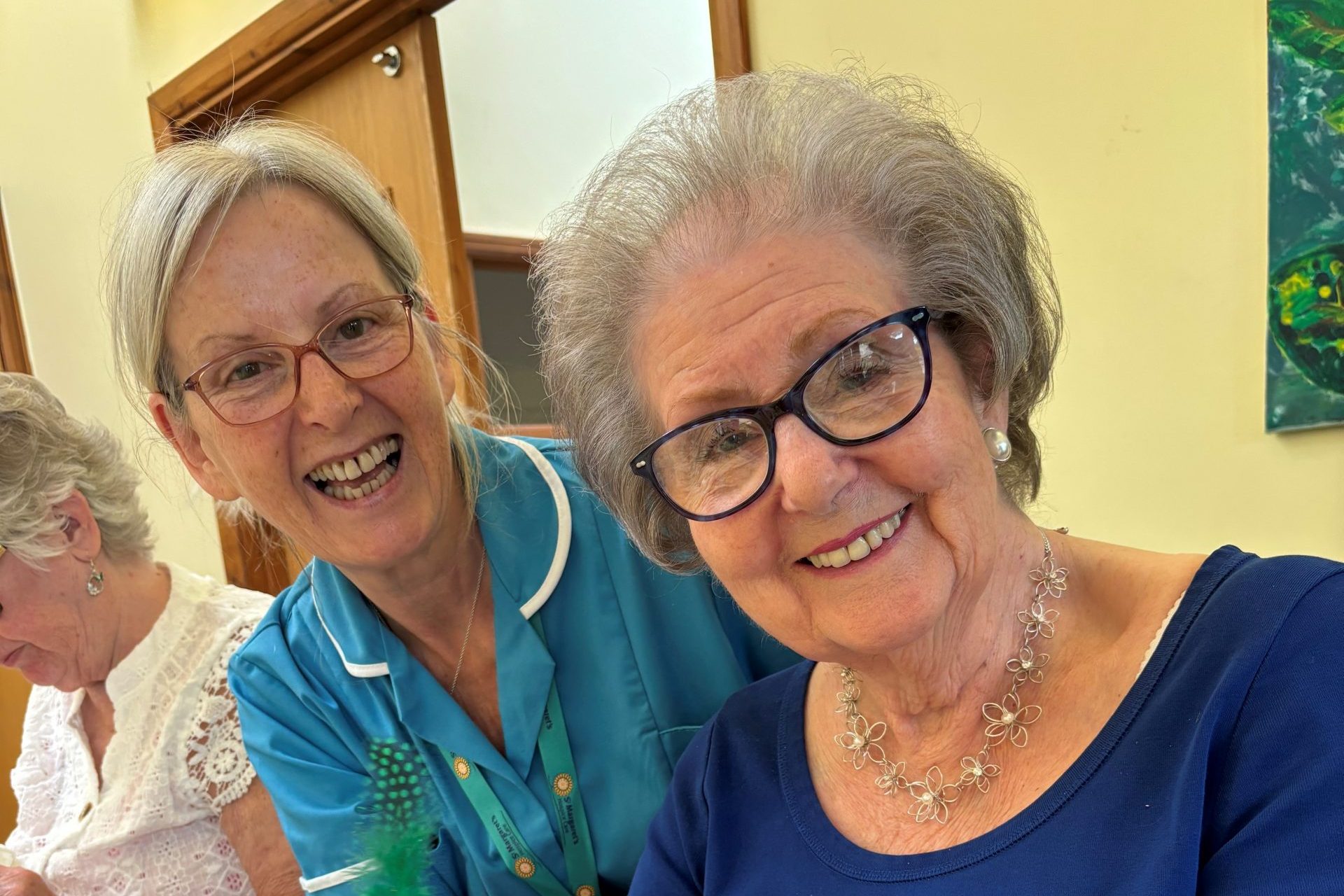 Nurse and patient in the St Margaret's Hospice Sunflower day centre in Yeovil