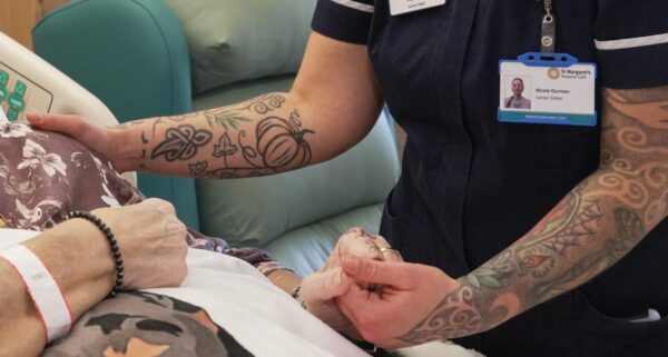 Female clinician attend to female patient