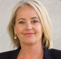 Sue Steen - female smiling to camera for professional headshot