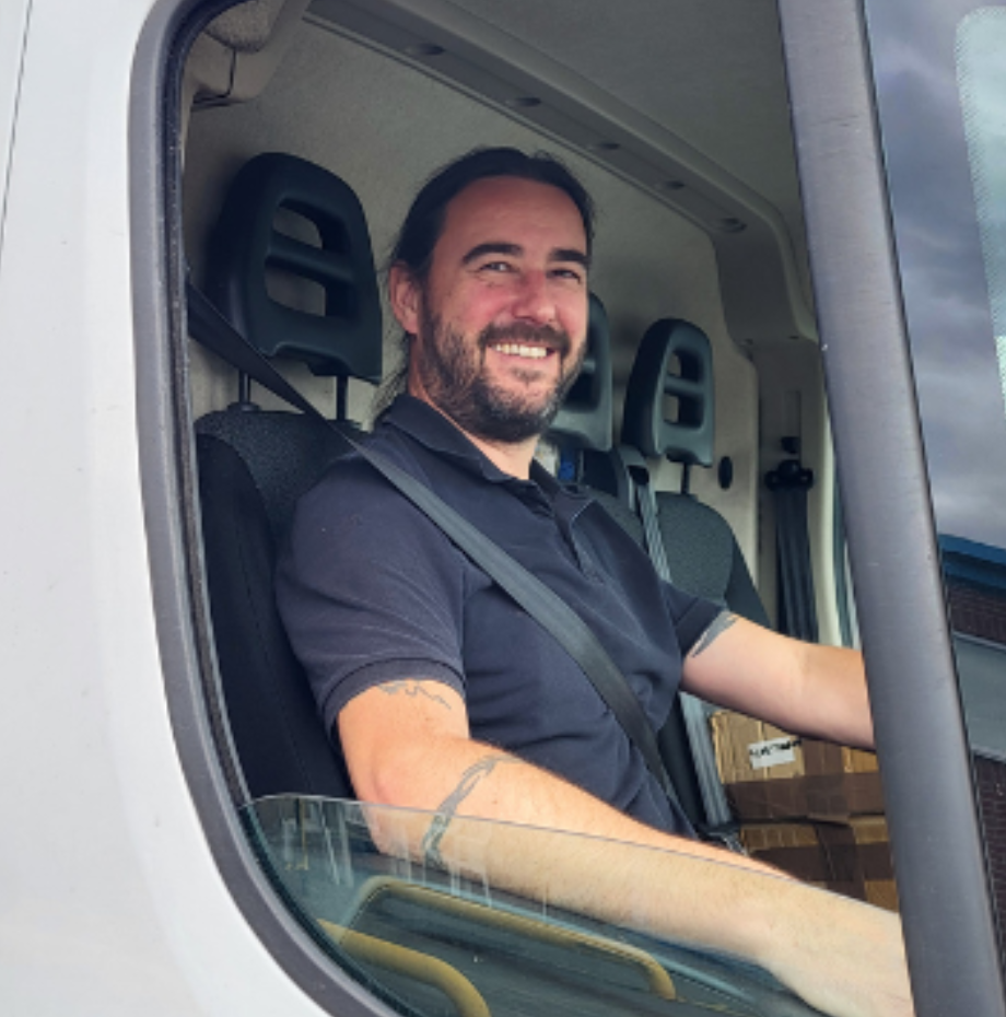 male behind wheel of a van