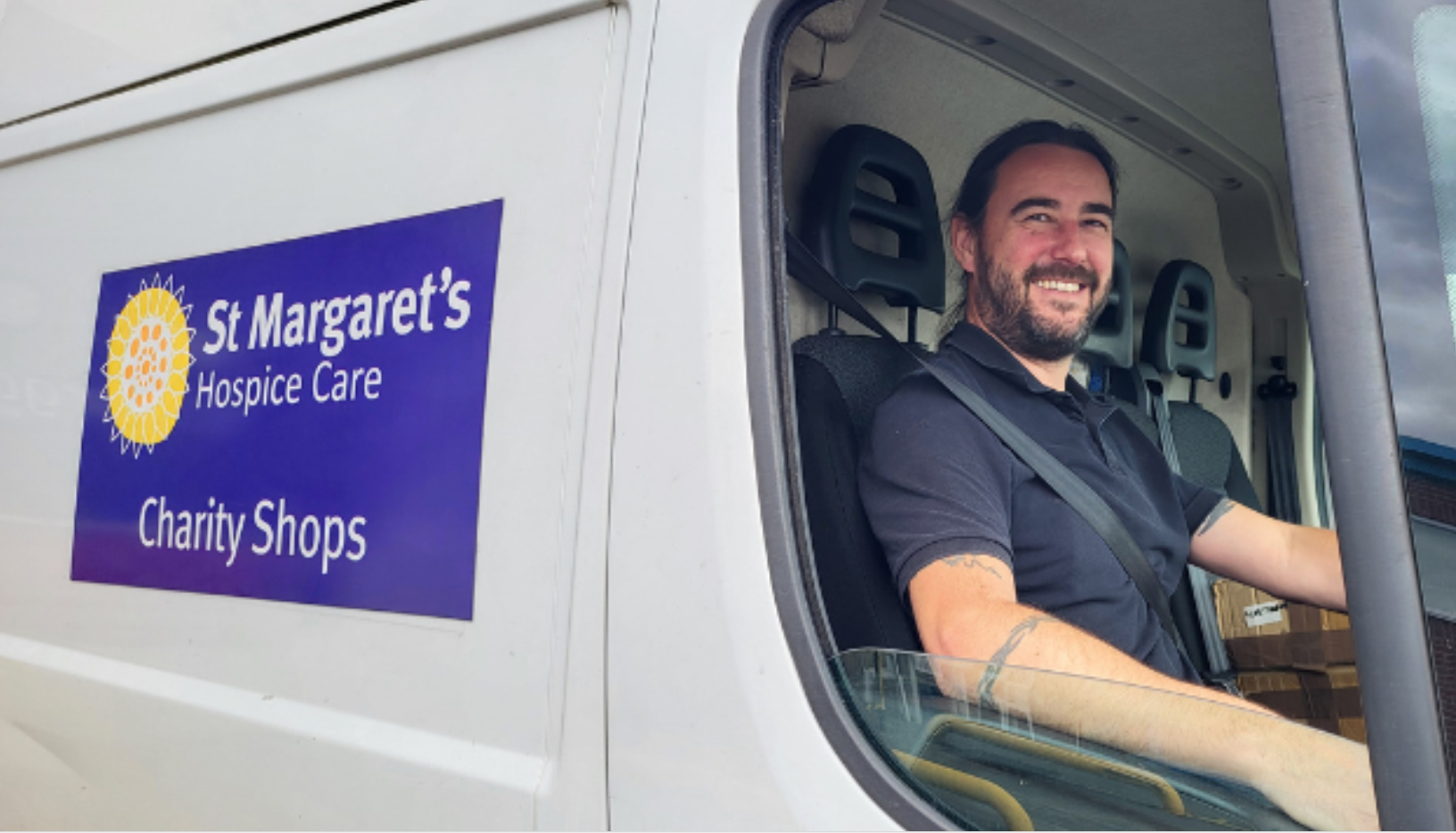male behind wheel of a van